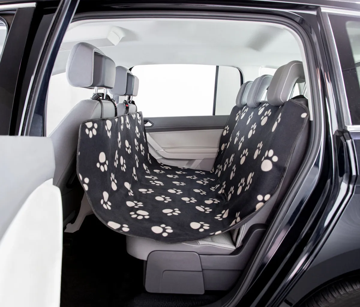 Autopotah nylon/flís, černý s béžovými packami 1,40 x 1,45 m